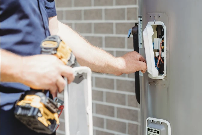 Assure Fix Plumber installing a new unit eligible for Hot Water System Rebates in Queensland.