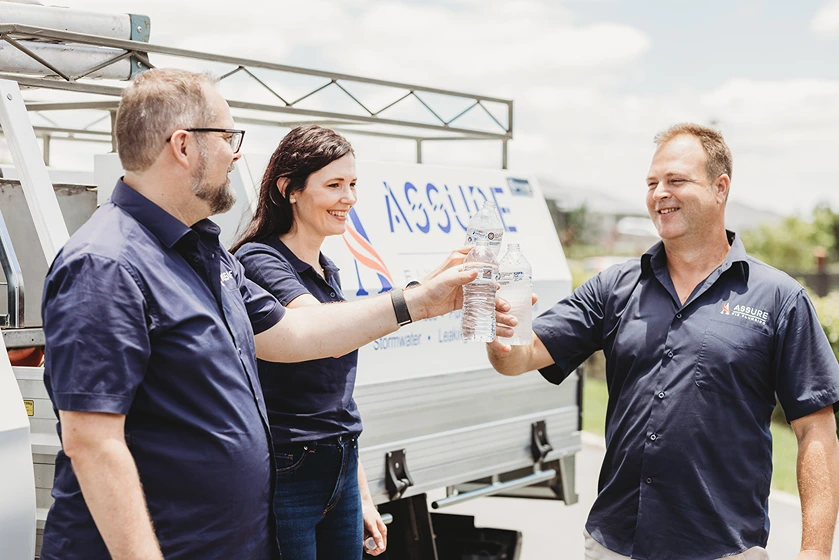 Trusted local plumbers from Assure Fix Plumbing on-site in Ipswich, delivering professional service with a smile.